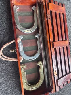 “Sportcraft Forged Steel Horseshoe Pitching Set with Wooden Carrying Case.”