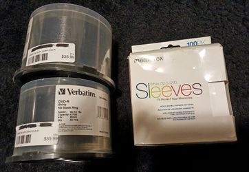 100 BRAND NEW DVDS and 100 COVERS