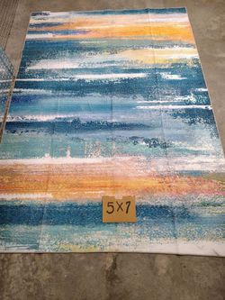 New 5 X 7 area rug machine washable