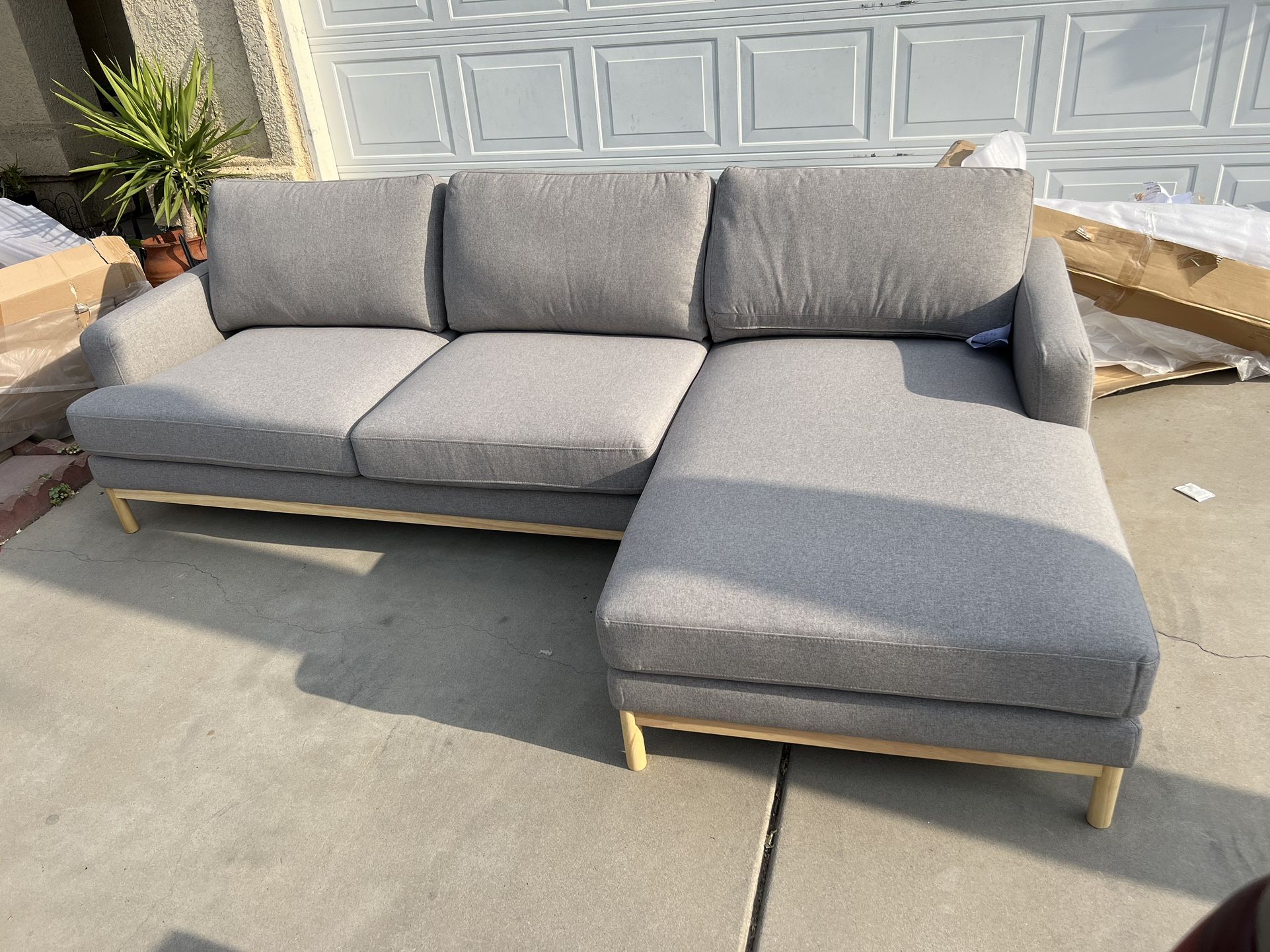 Brand New. Mid Century Modern Sofa Sectional. Concrete/grey right chaise side. Retails Over $2200