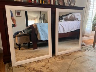 Two framed mirrors