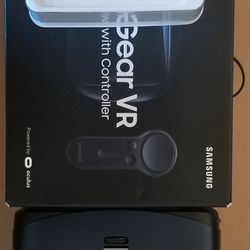 Samsung gear vr in box with manual and controller.