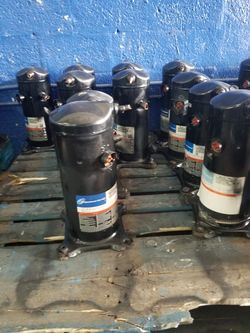 Air conditioning compressors