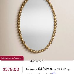 Gold beaded oval mirror 