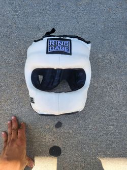Ring to cage headgear