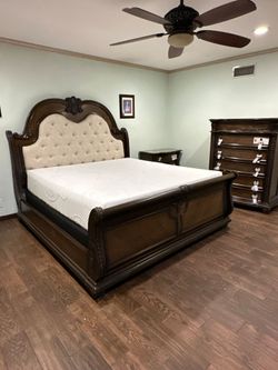 King Size Bed Frame solid wood new in a box.    We offer same day delivery