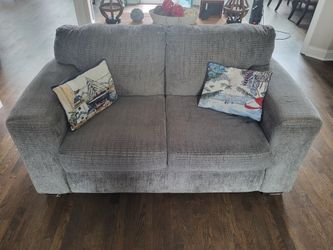 Gray sofa and love seat