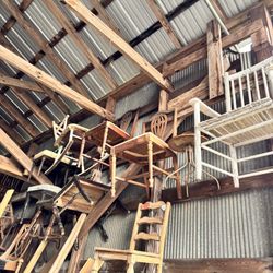 Warehouse Full Of Antique Chairs And Furniture