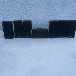 7  Bose Double Cube DoubleShot Black Speakers 1 Center + 6 Surround & 3 Mounts Used in good condition with some cosmetic blemishes. These blemishes ar
