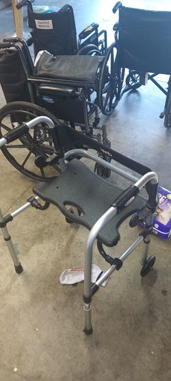 Walker With Converted Seat.