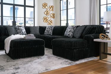 Midnight-Madness 4-Piece Sectional with Chaise (Brandnew) shipping available within 30 mi