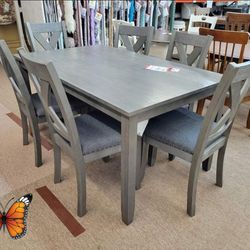 Ashley Caitbrook Dinette Sets Tables and 6 Chairs 