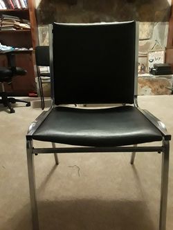 Black leather metal trim chair