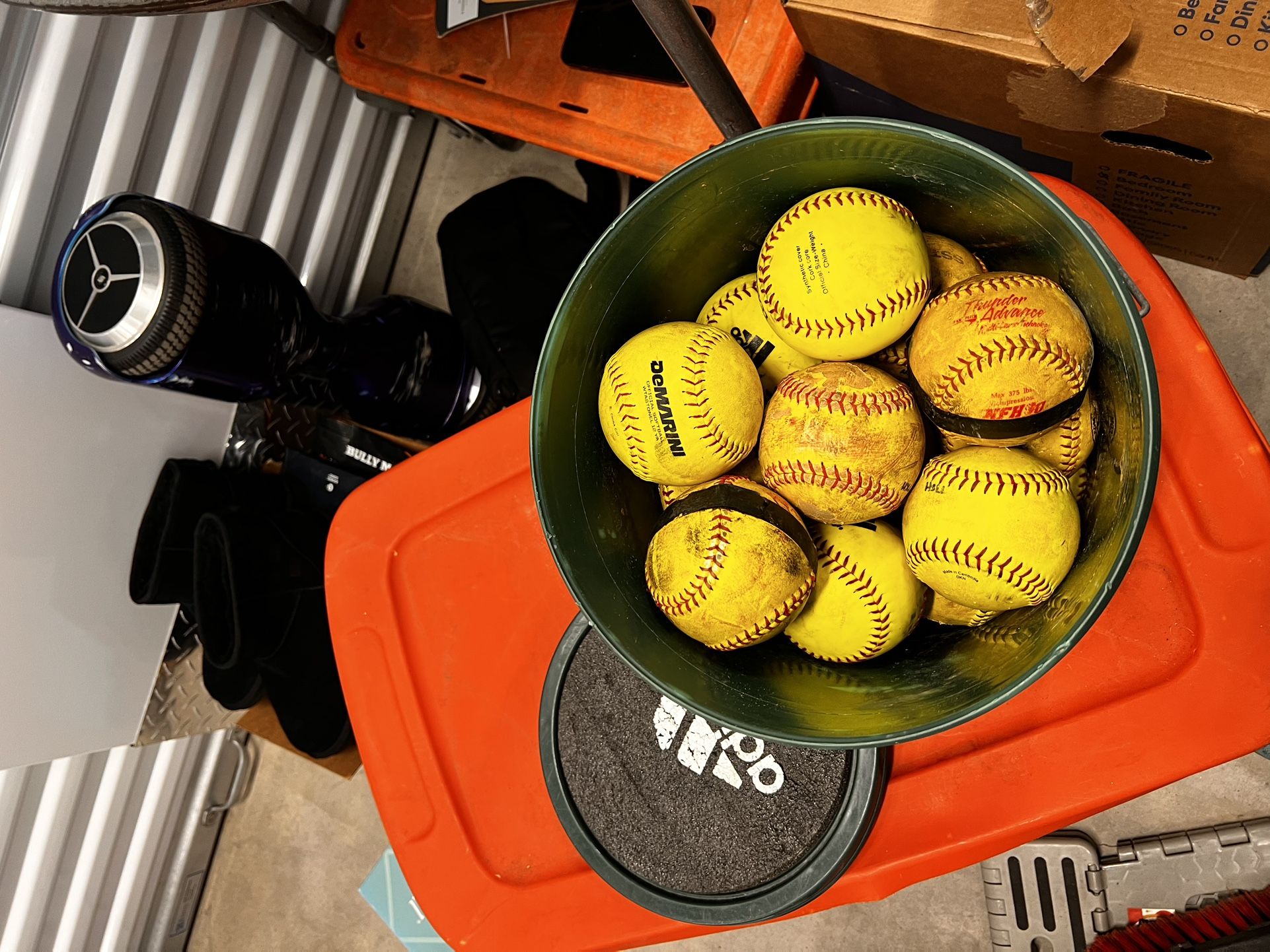 Bucket Of Softballs.