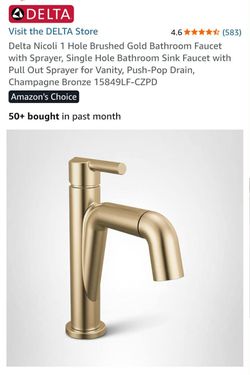 Delta bathroom sink faucet with sprayer champagne bronze