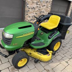 John Deere L120 20HP Vtwin Engine And 48” Deck And 2 Bin Bagger Riding Mower