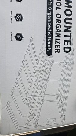 Wall mounted tool organizer