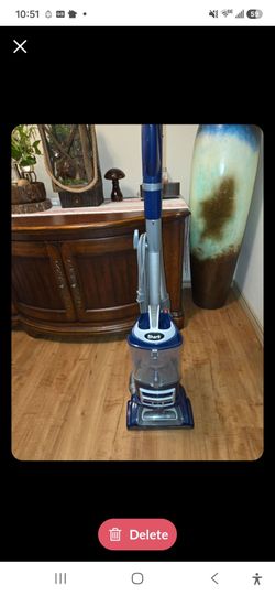 Shark brand vacuum cleaner for bare floors and carpet