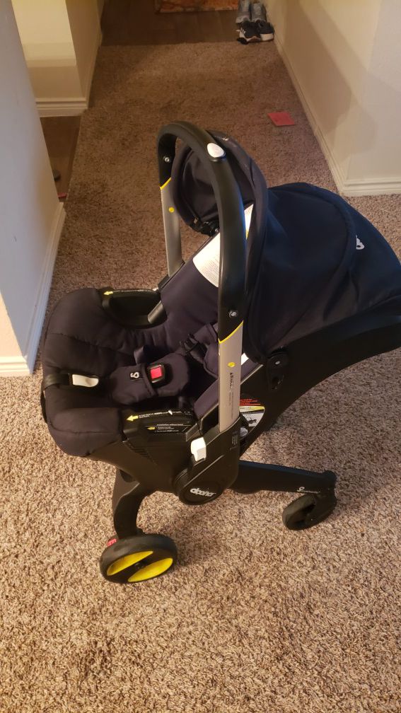 Doona car seat and stroller with base