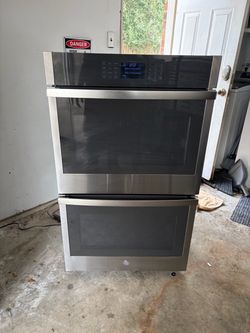 GENERAL ELECTRIC 30 X 50.5 STAINLESS STEEL DOUBLE ELECTRIC OVEN