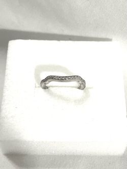 Brand new .925 silver wedding band ring with cubic zirconia CZ diamonds. Size 5