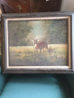 Hand painted picture of a buck.