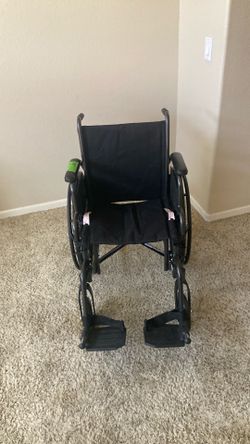 Wheelchair New with Adjustable Footrests