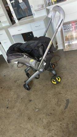 Doona Car Seat + Latch Base Travel System - Nitro Black: Rubber Tires, Aluminum Frame, Minimum Weight 4 Lbs, Weight 10 Lbs