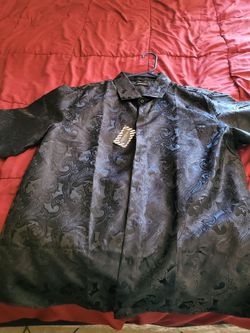 Black Dressing shirt new we are on 19th ave and baseline if you like to come look at it large