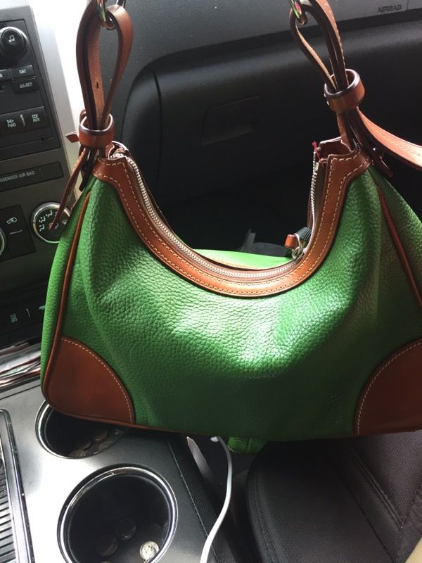 Dooney n bourke new with coin purse authentic green and brown leather really nice gift or just because