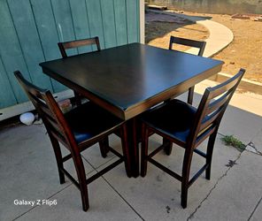 Dark wood, versatile space saving table, 4 chairs,  bought from West Elm.