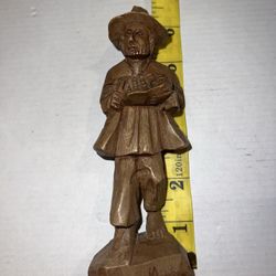 Hand Carved Wood Figurine Of Barefoot Man Holding Bowl