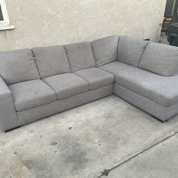 Delivery Available / Ashley’s Furniture Grey Sectional