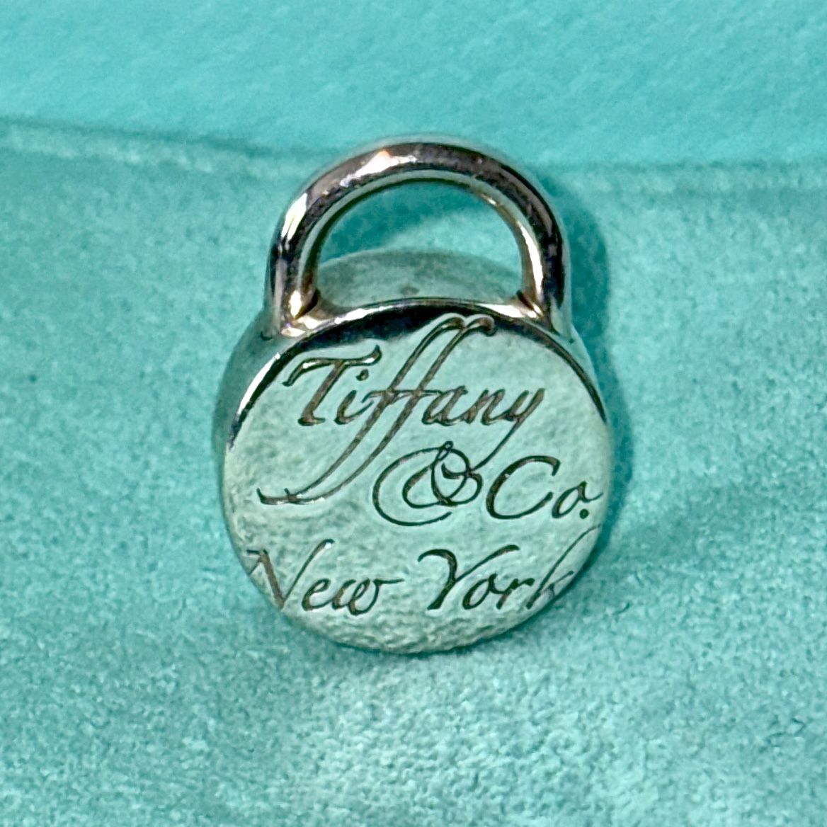 Tiffany & Co. Circle Notes Padlock Charm