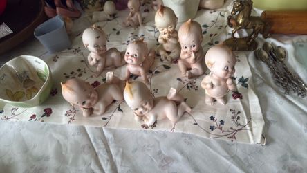 7 kewpie ceramic Baby dolls