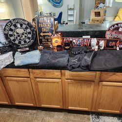 Variety of Harley Items – Clothing, Saddle Bag Inserts, Signs, Dartboard + More