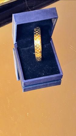 Gorgeous gold tone Louis Vuitton Bangle