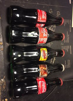 8oz collectible Coca Cola bottles