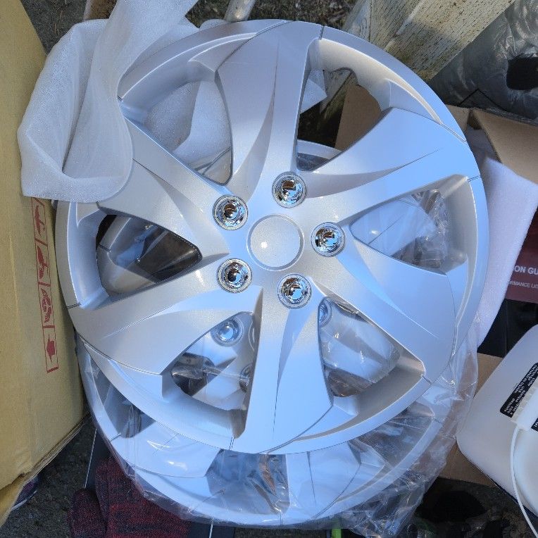 4 Brand New 16-in Hubcaps