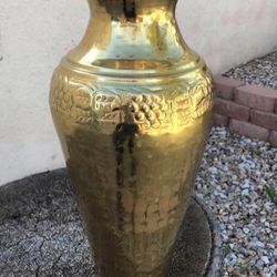 Large-tall vintage Brass vase with fruit design etched into it $28.00