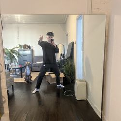 Large frameless mirror