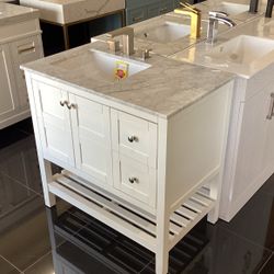 White 36” Spa Style Vanity With Marble Top And Sink To The Left