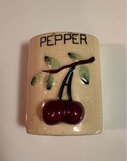 Vintage ceramic cherry pepper shaker, part of a mid-century kitchen set typically manufactured in Japan during the 1940s to 1960s.