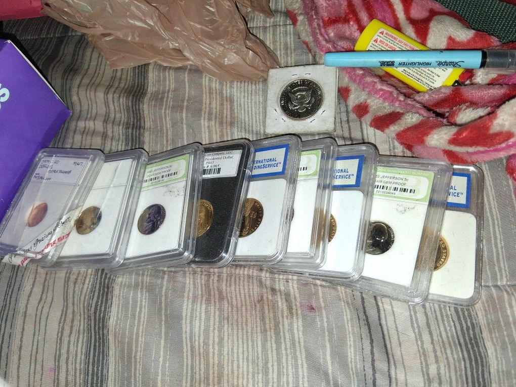 Graded Coins And A Romsn Coin For Sale