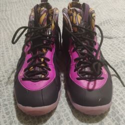 The Nike Air Little Foamposite One Boys' DQ6210-500 Black/Purple Basketball Shoes in size 7Y