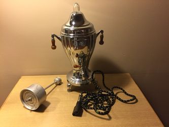 Antique coffee urn with electric cord and percolator apparatus