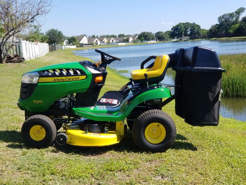 John Deere D105 17.5HP Automatic 42in Riding Lawn Mower. With grass