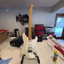 Squire by Fender Stratocaster affinity series cream Olympic white electric guitar with guitar ultra stand. 