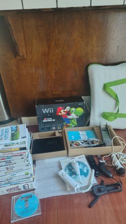 Nintendo Wii bundle 23 games two remotes tested and working