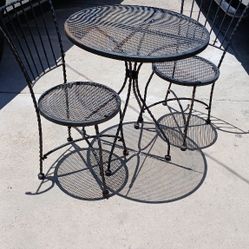 Wrought Iron Table And Chairs